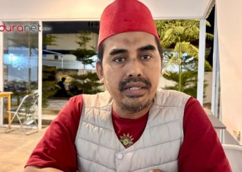 Kuasa hukum Kepala Unit Pegadaian Syariah (UPS) Palengaan, Ainor Ridho saat ditemui di Hooki Cafee, Rw. 01, Parteker, Kabupaten Pamekasan, Rabu (11/3/2026).